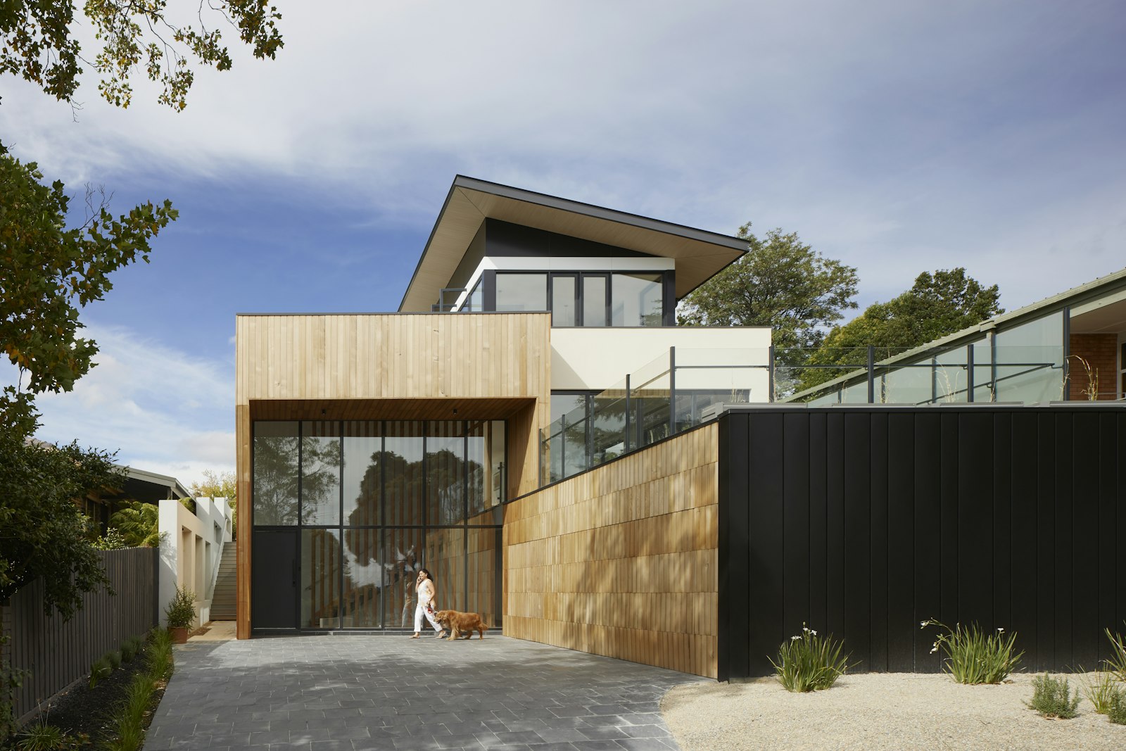 Contemporary custom residential architecture representing a coordinated building project